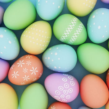 Easter eggs with white designs from a white crayon.
