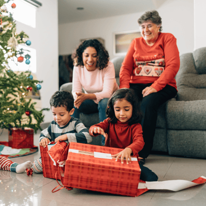 A family opening presents on Christmas Day.