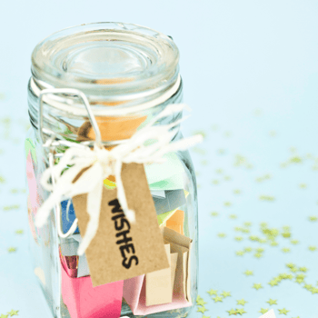 A jar filled with notes.