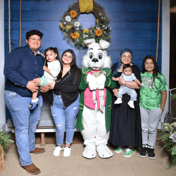 A family with the Easter Bunny.