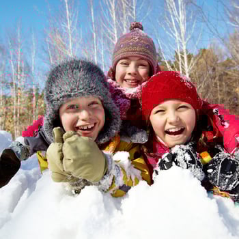 Kids playing in snow.