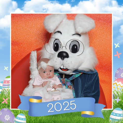 Tiny baby getting photo with the Easter Bunny