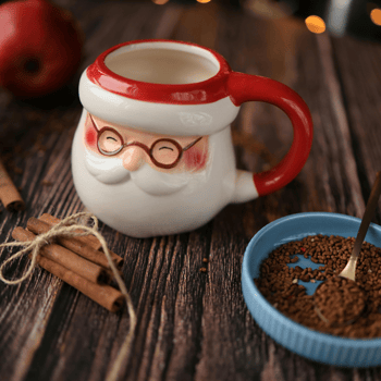 A cinnamon stick bundle next to a Santa mug.