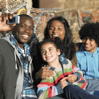 A family taking a picture together.