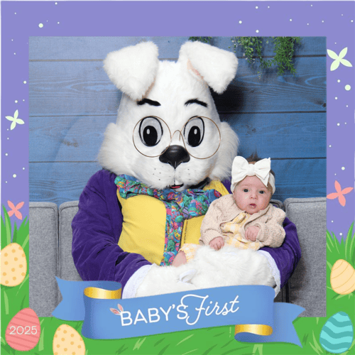 Sweet baby meets the Easter Bunny for the first time