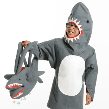 Little boy in a shark costume