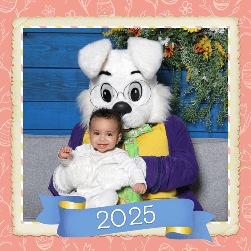 Happy baby meets the Easter Bunny for the first time