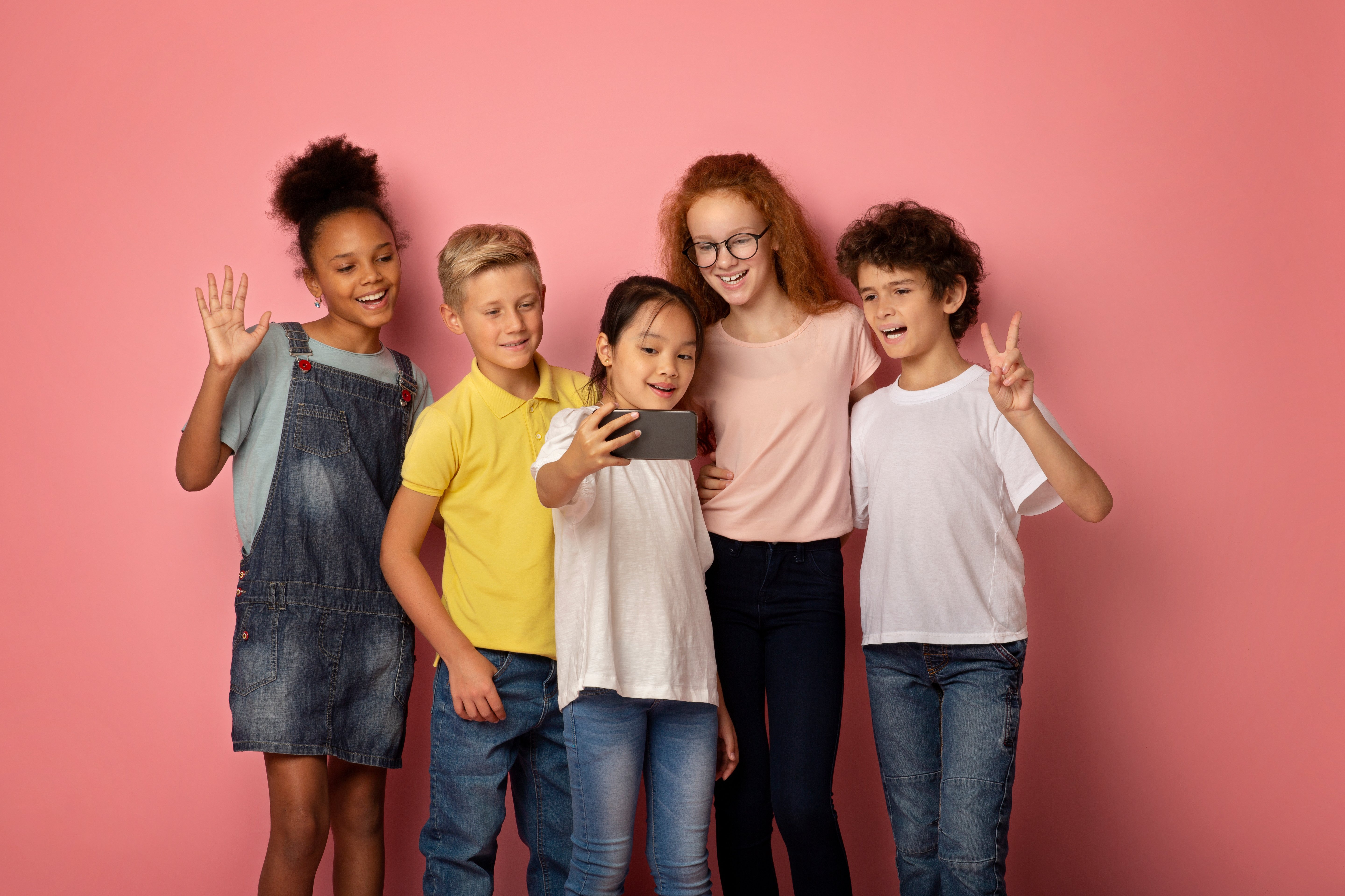 kids taking selfie together children on solid background group 