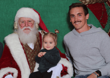 dad and daughter with santa