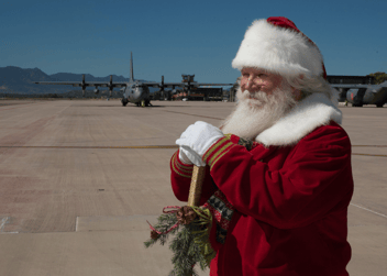 santa standing on NORAD runway