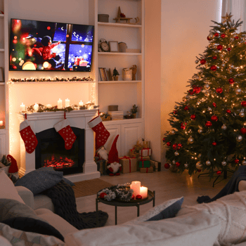 Christmas Movie playing in a decorated living room.