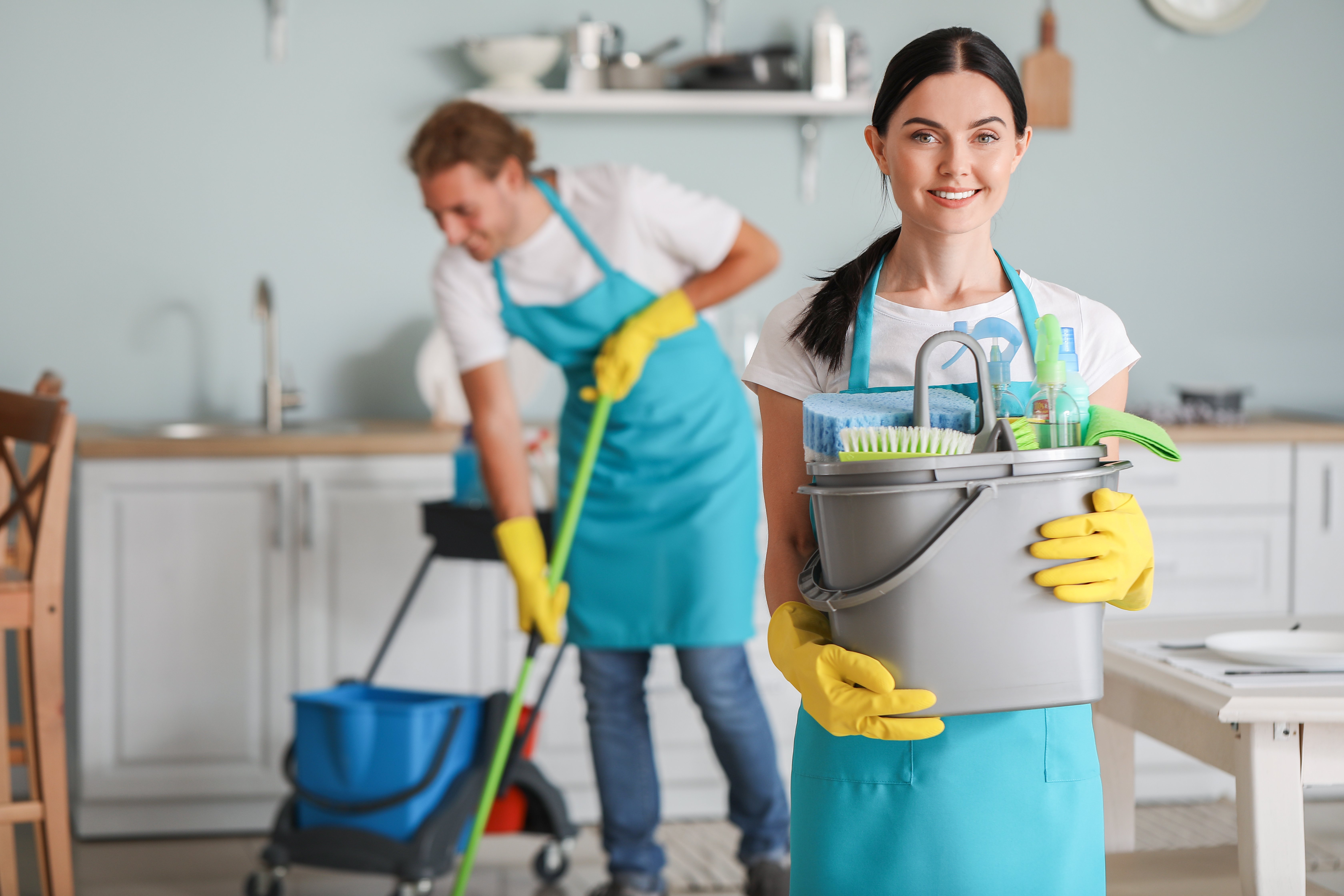 man_and_woman_cleaning_spring_cleaning