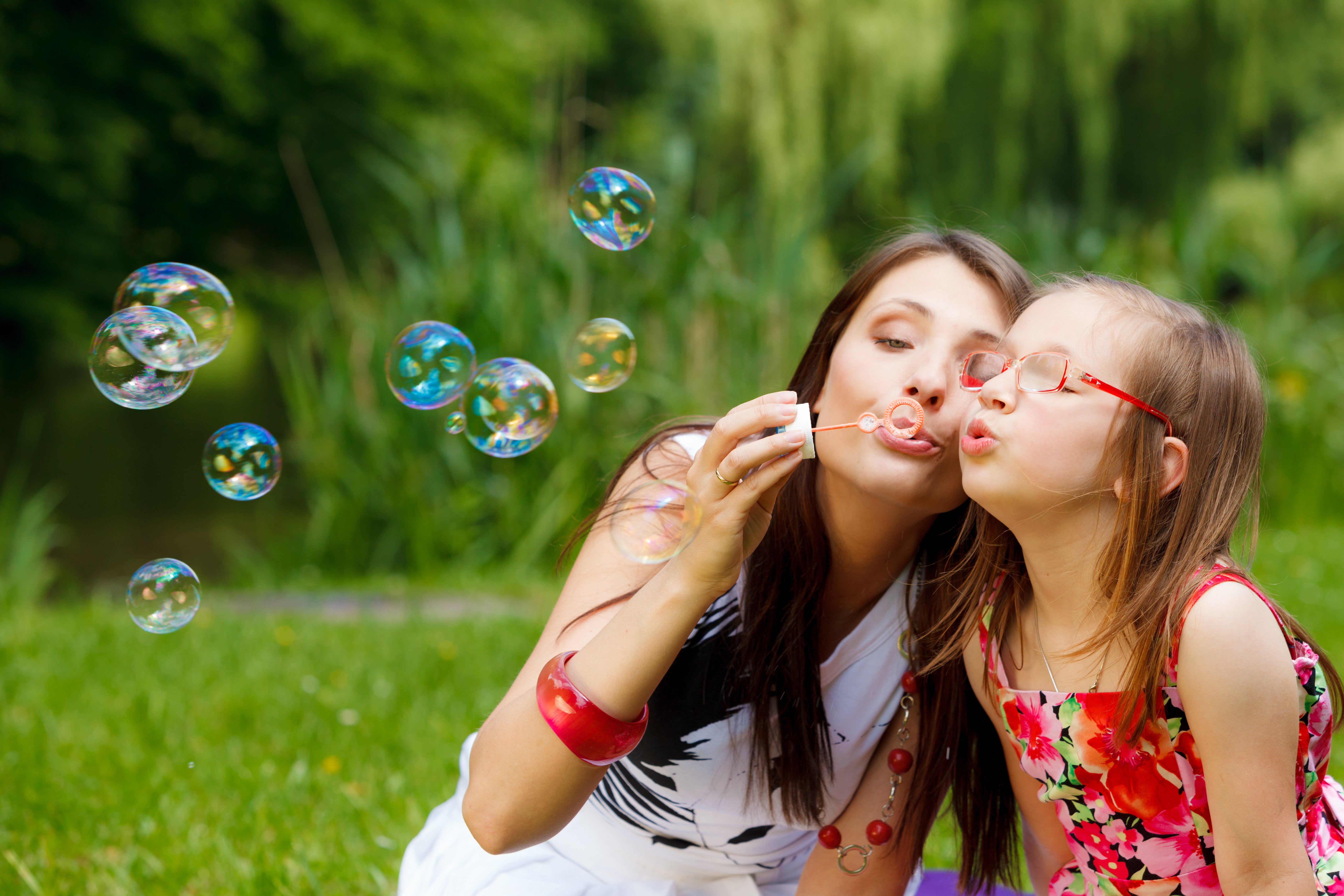 bubbles-mother-daughter-blowing-bubble
