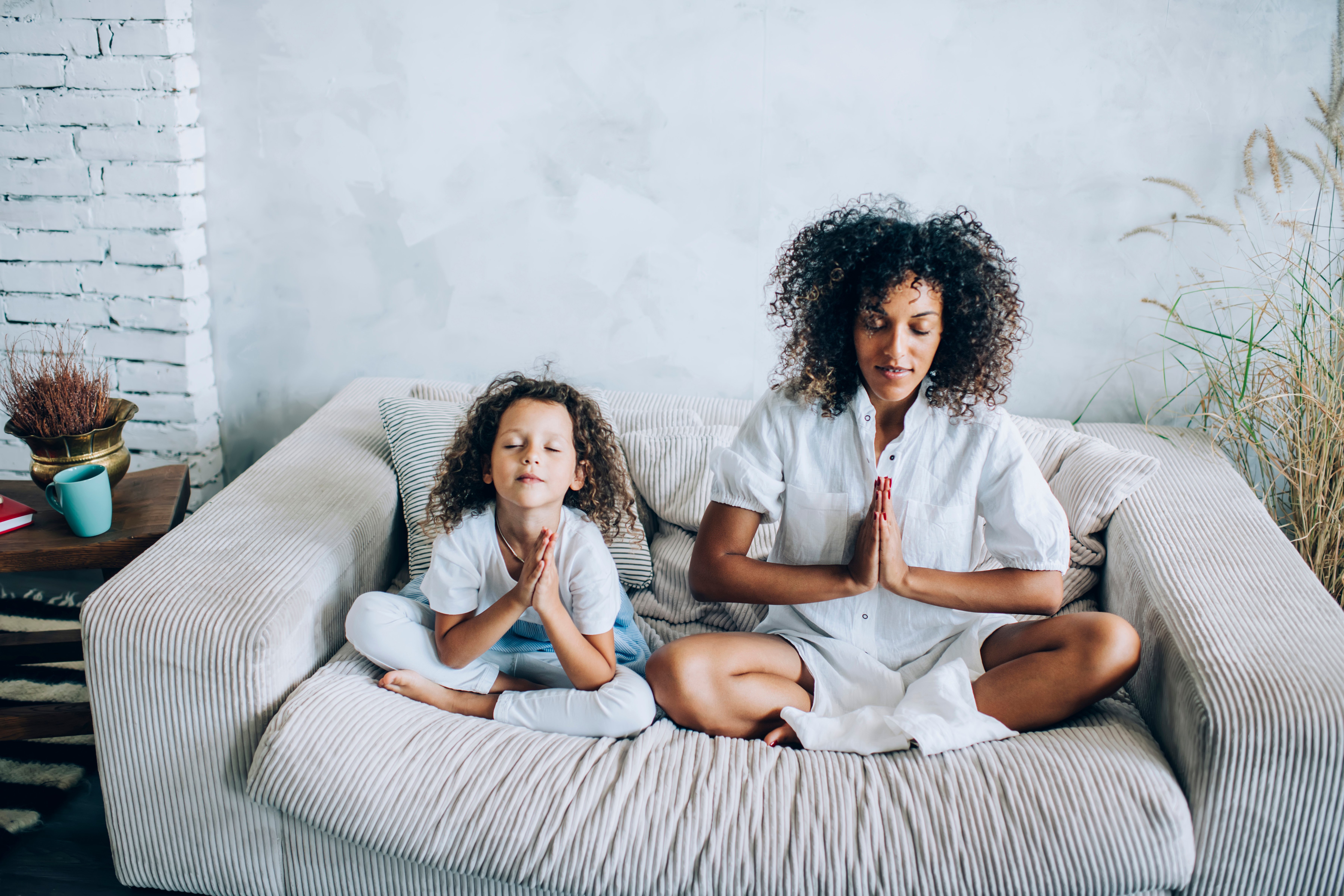 meditation-family-mother-daughter-meditating-seated-lotus-position-namaste-hands-quiet-mindfulness