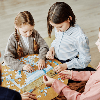 Family putting together a puzzle