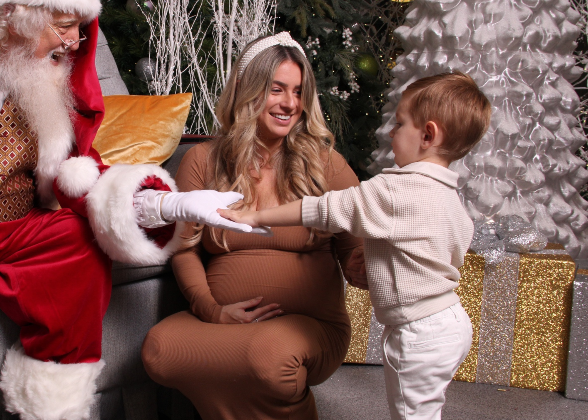 Mother and son meeting santa claus
