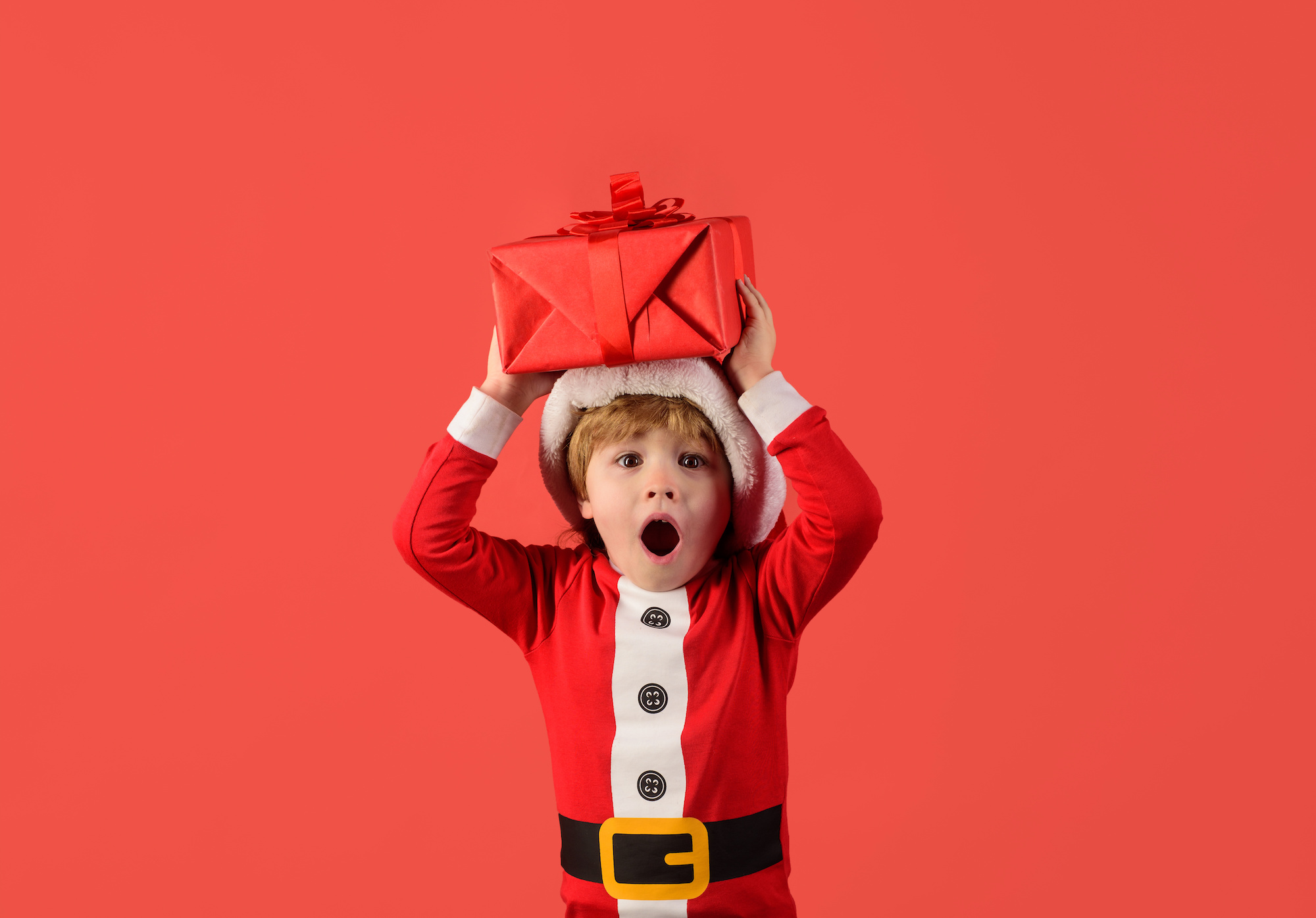 little boy in Santa Claus costume