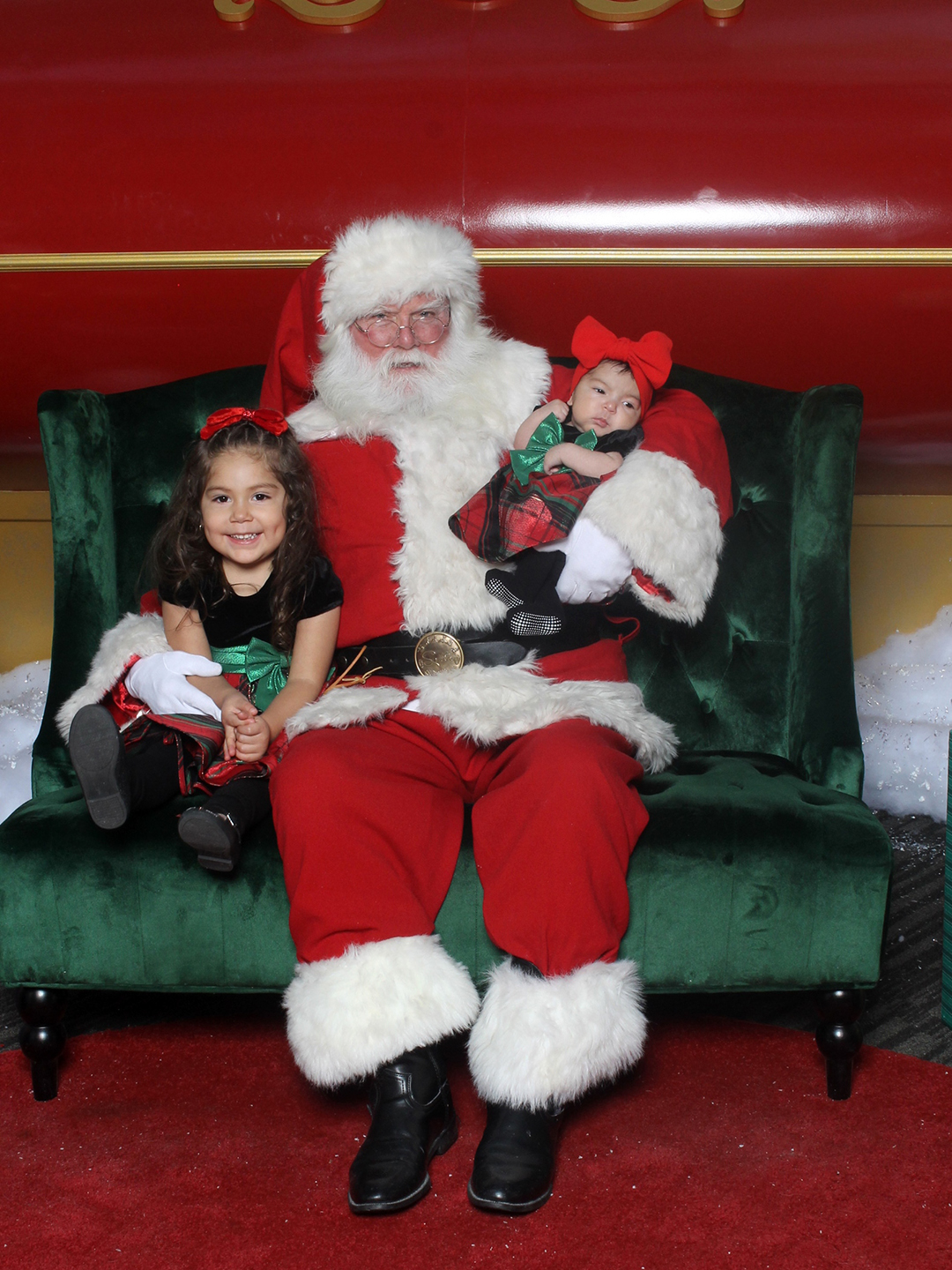 family visiting with santa