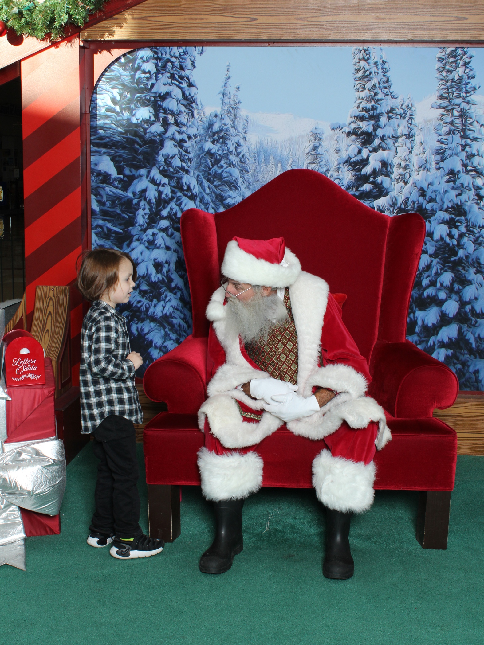 family visiting with santa