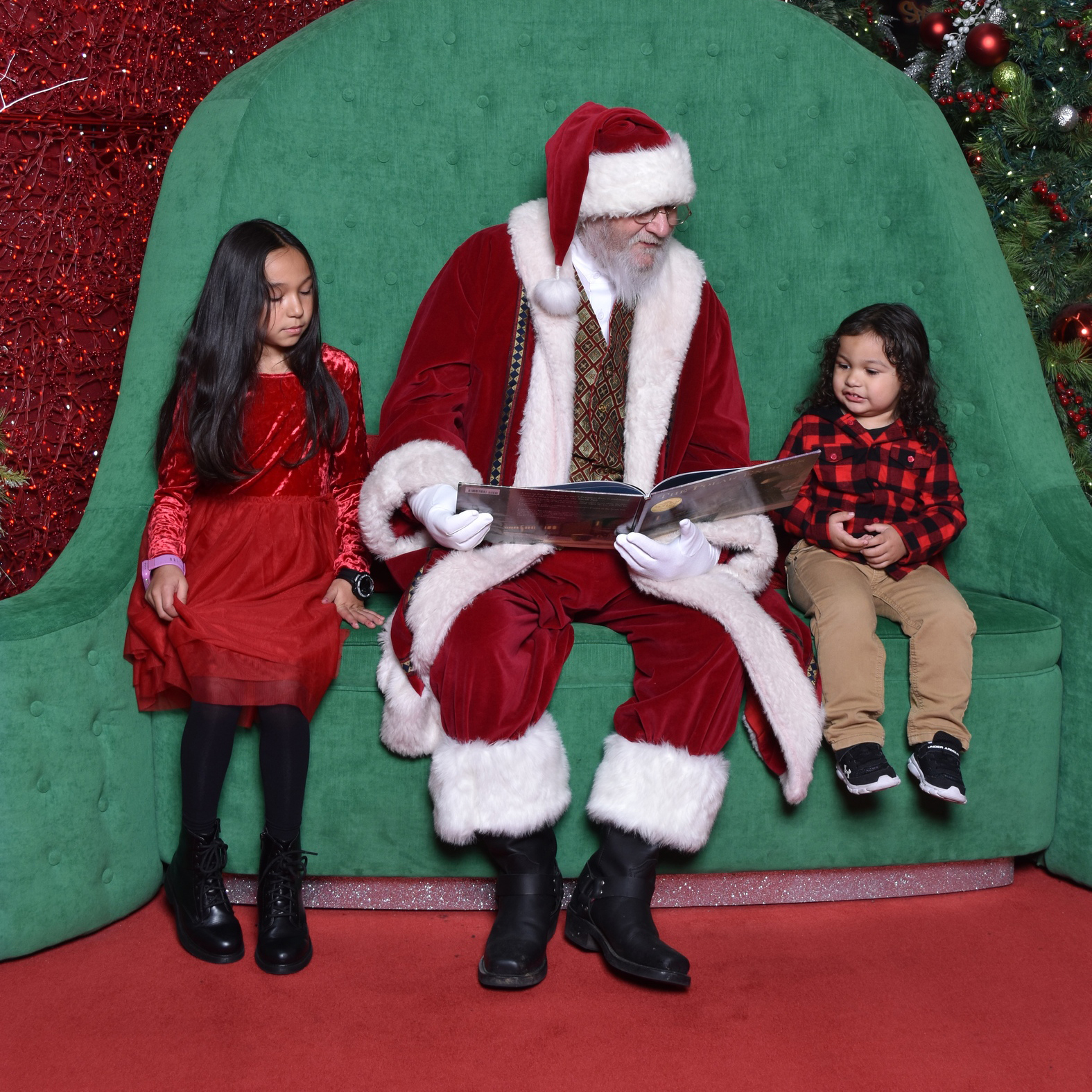 family visiting with santa